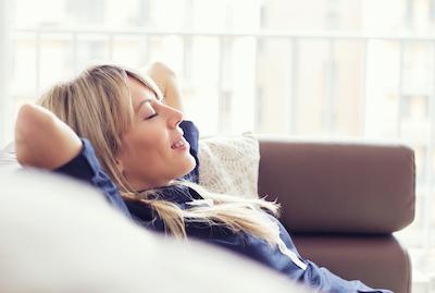 etobicoke woman relaxing on the couch
