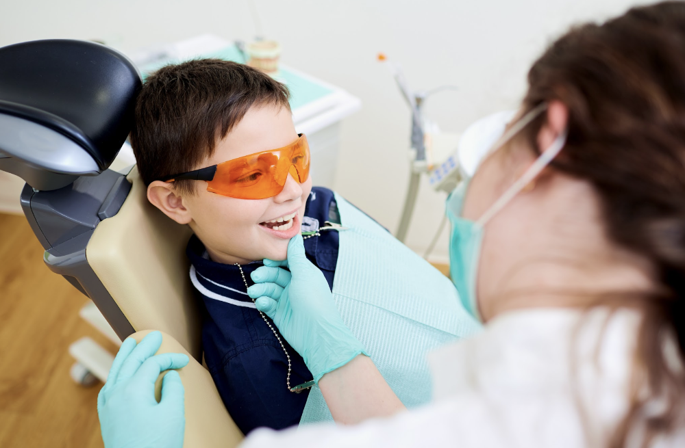 Young boy smiling in the dental chair