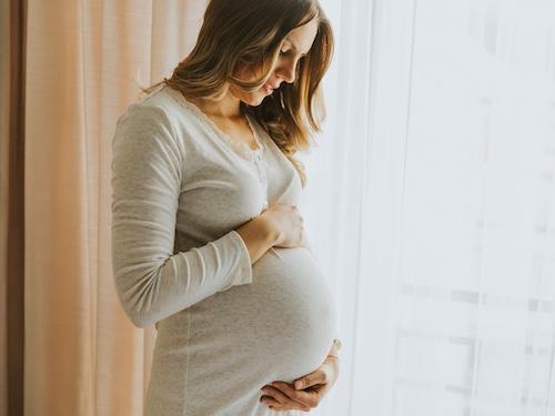 pregnant woman smiling