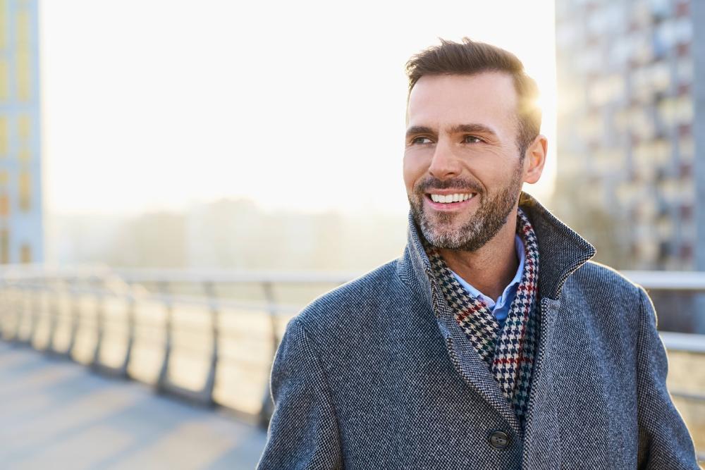 Etobicoke Man smiling in gray jacket