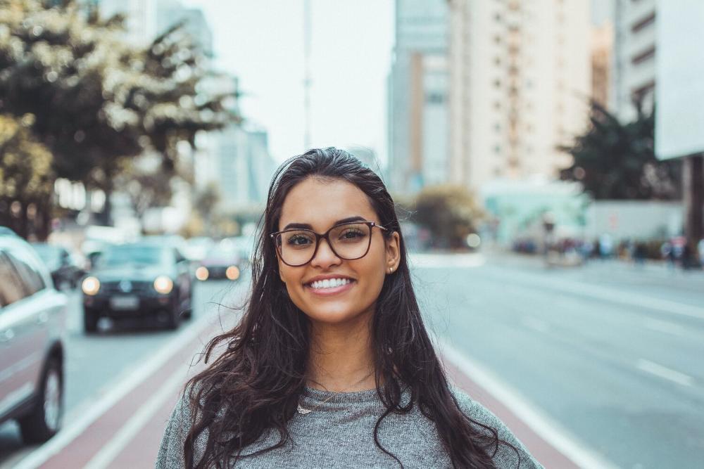 woman standing in city street