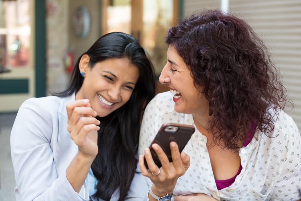 two women laughing