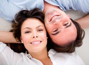 toronto man and woman smiling up at camera