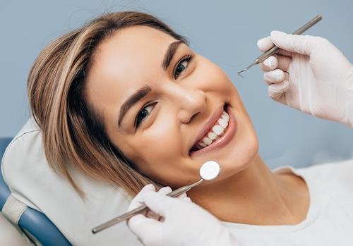 etobicoke woman smiling in dental chair 