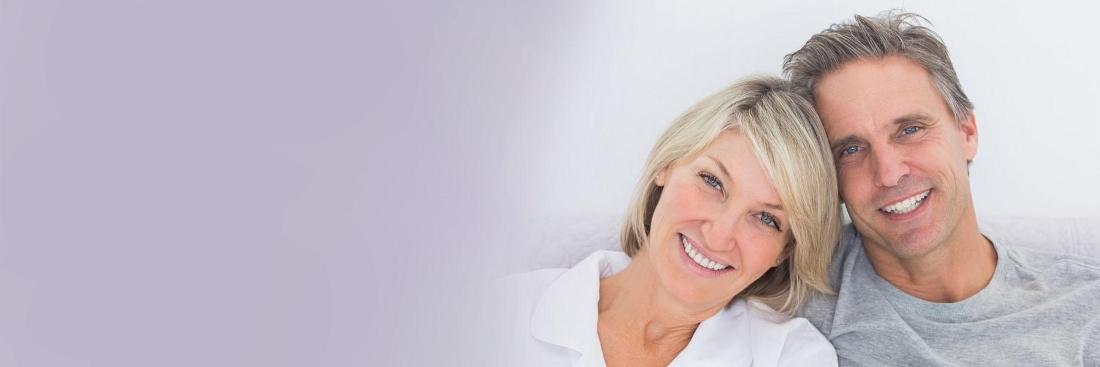 Older couple smiling 