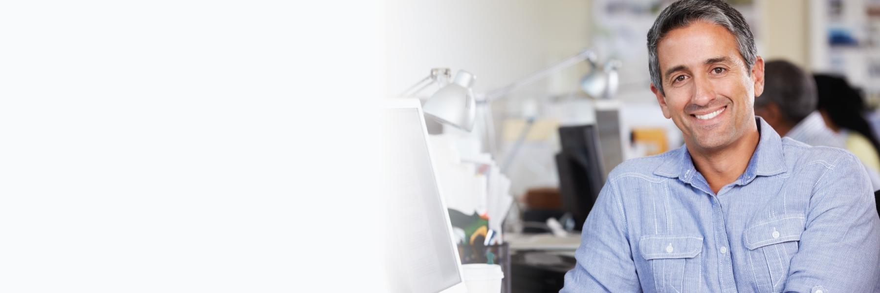 Man smiling in office in etobicoke