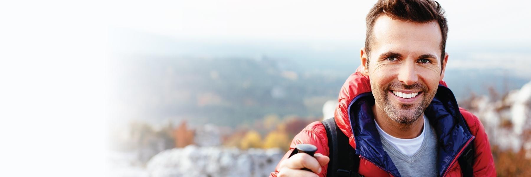 Etobicoke Man in red jacket smiling