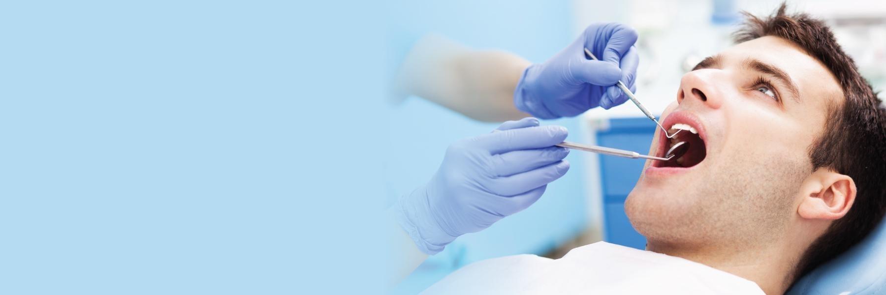 Man getting dental work done in toronto