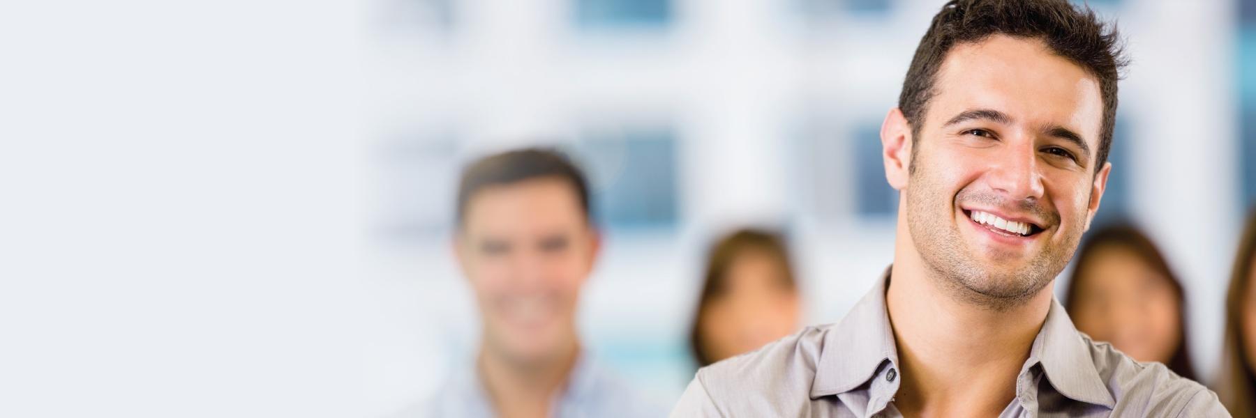 Man smiling after getting veneers from an etobicoke dentist