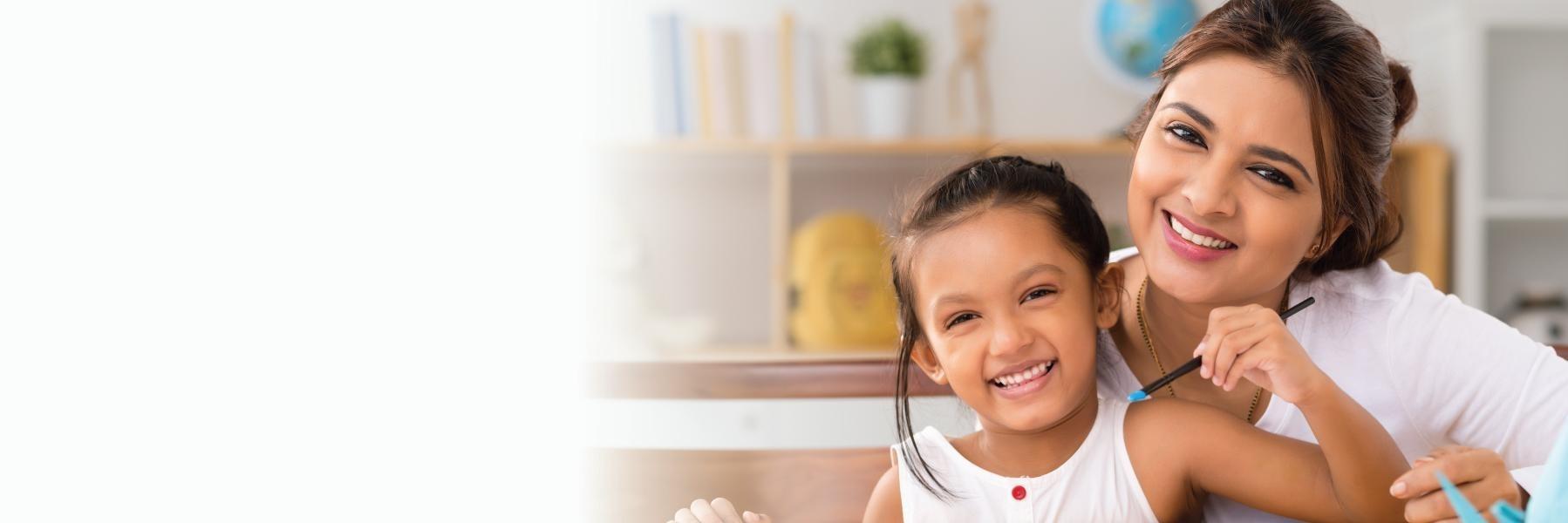 mom and daughter smiling in etobicoke