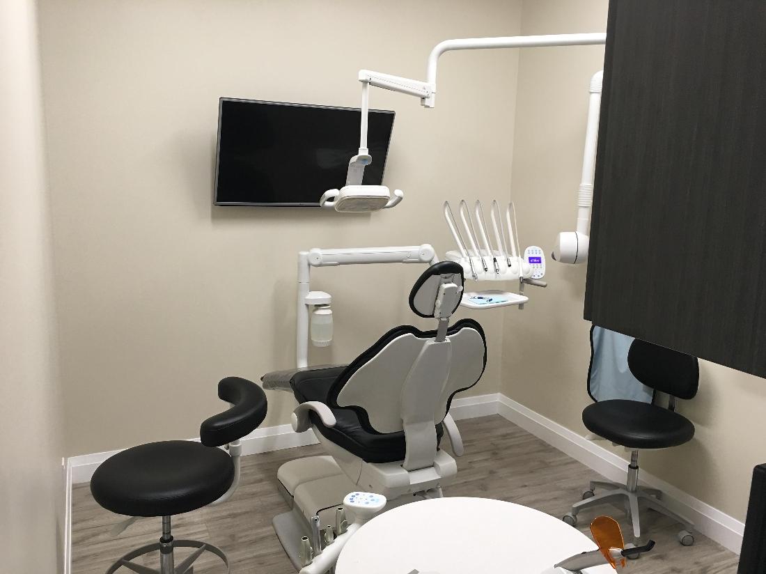 Modern dental office with tv for patients in etobicoke