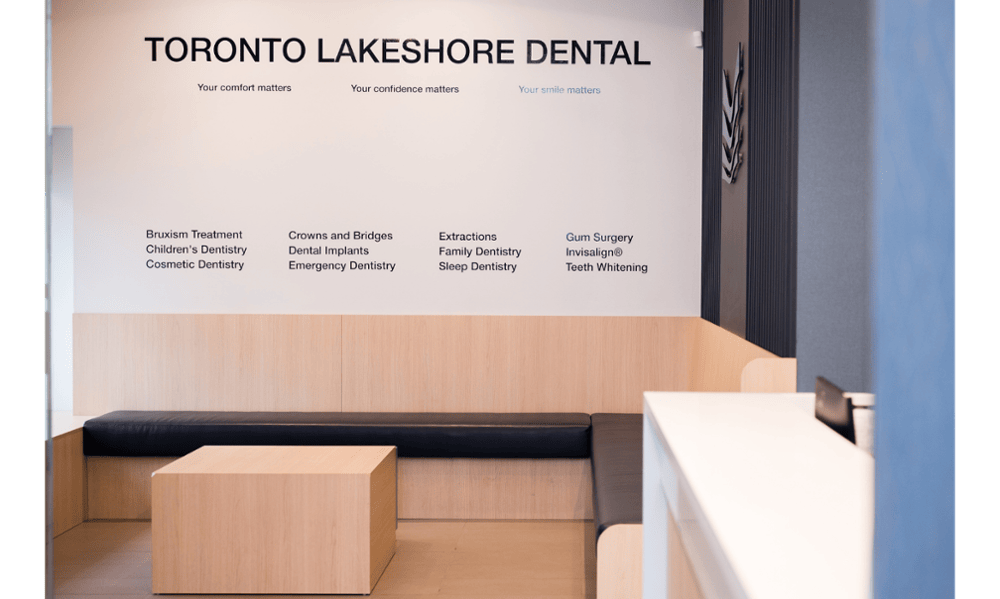 Patient waiting area with service list at Toronto Lakeshore Dental in Etobicoke